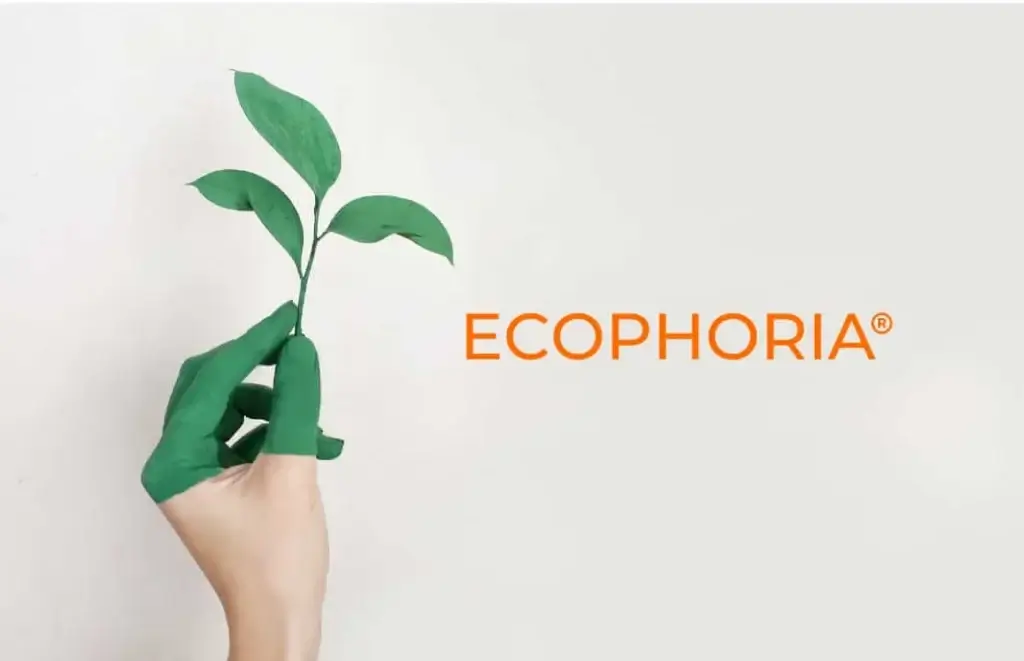 A hand with green-painted fingers holds a leafy stem next to the word “ECOPHORIA.”