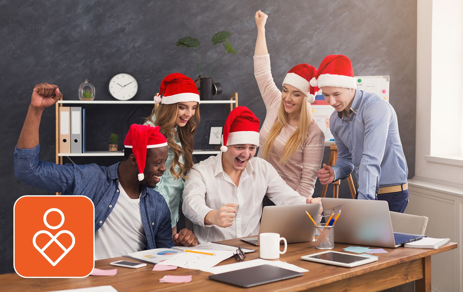 Happy employees in an organization that avoids holiday burnout