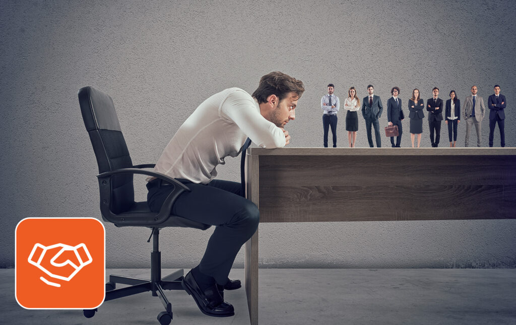 Hiring manager reviewing common recruitment challenges and staffing solutions