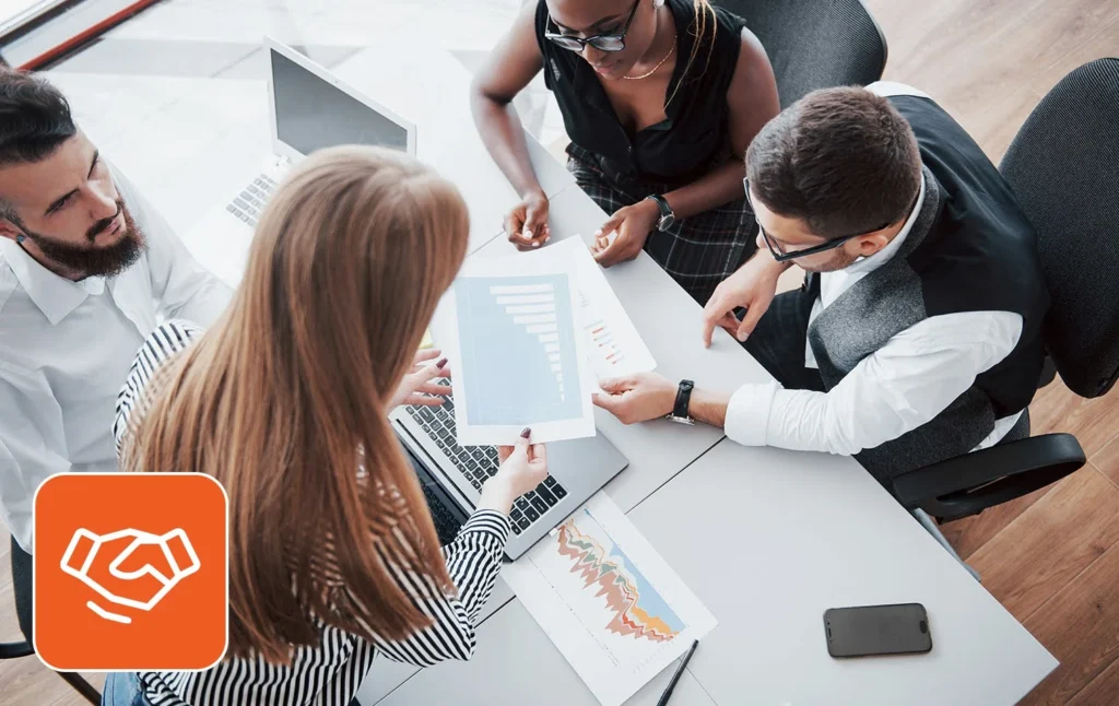 Team collaborating on project-based staffing strategy in an office setting