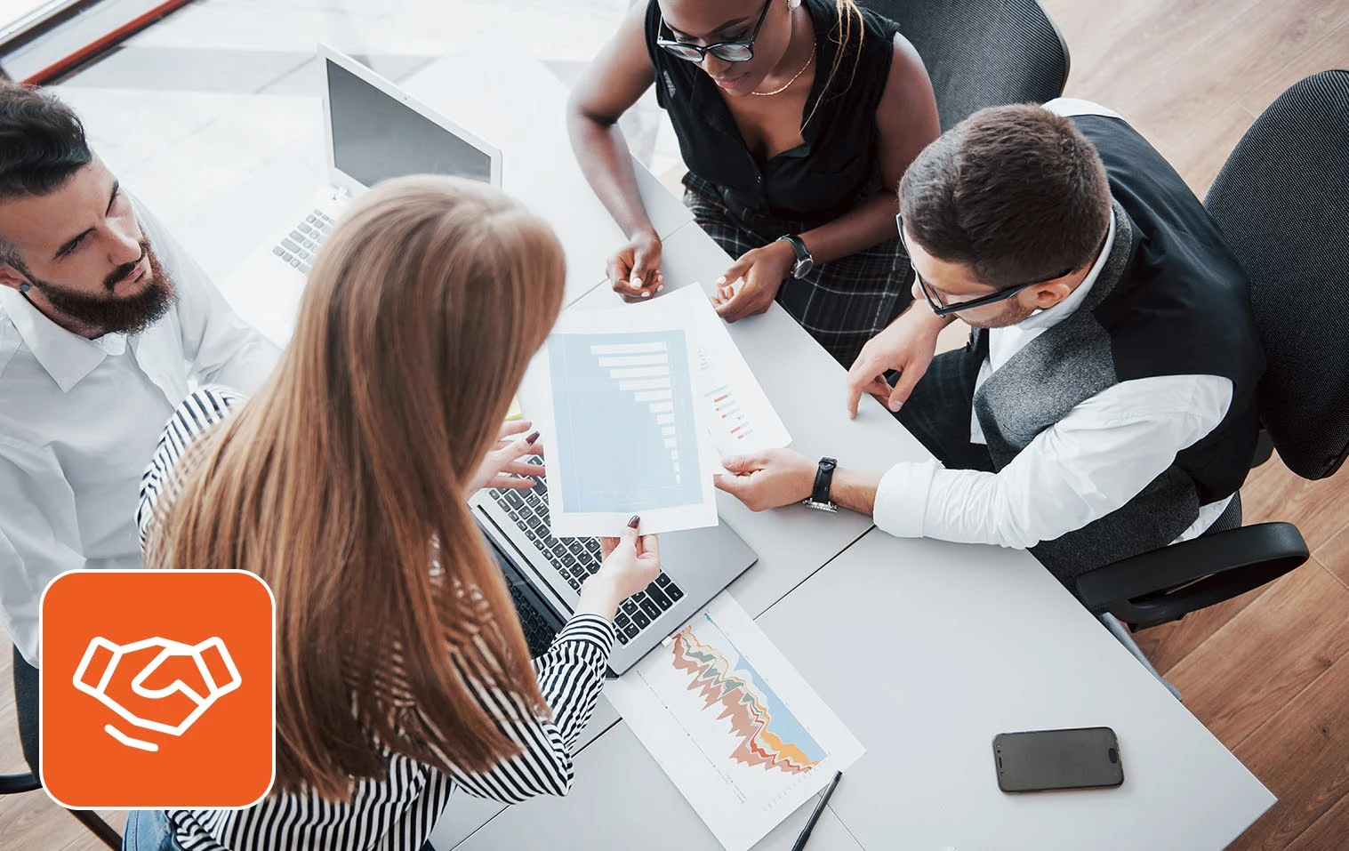 Team collaborating on project-based staffing strategy in an office setting