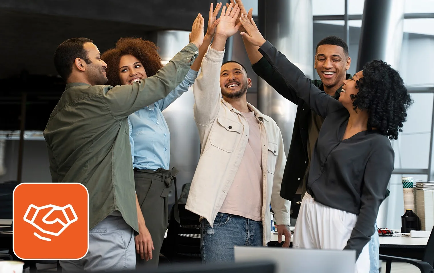 Joyous staff giving each other high-fives.