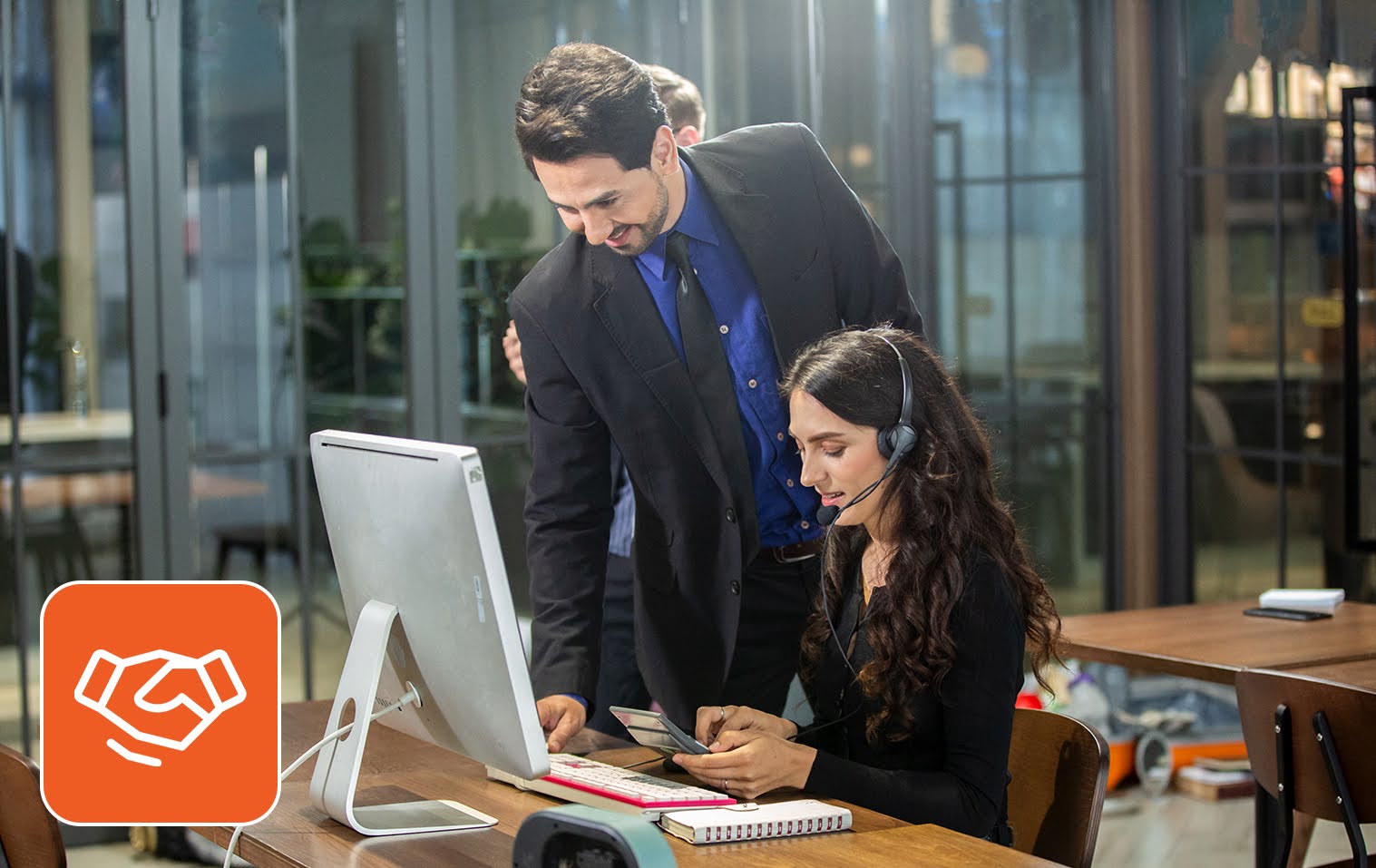 two people engrossed in work