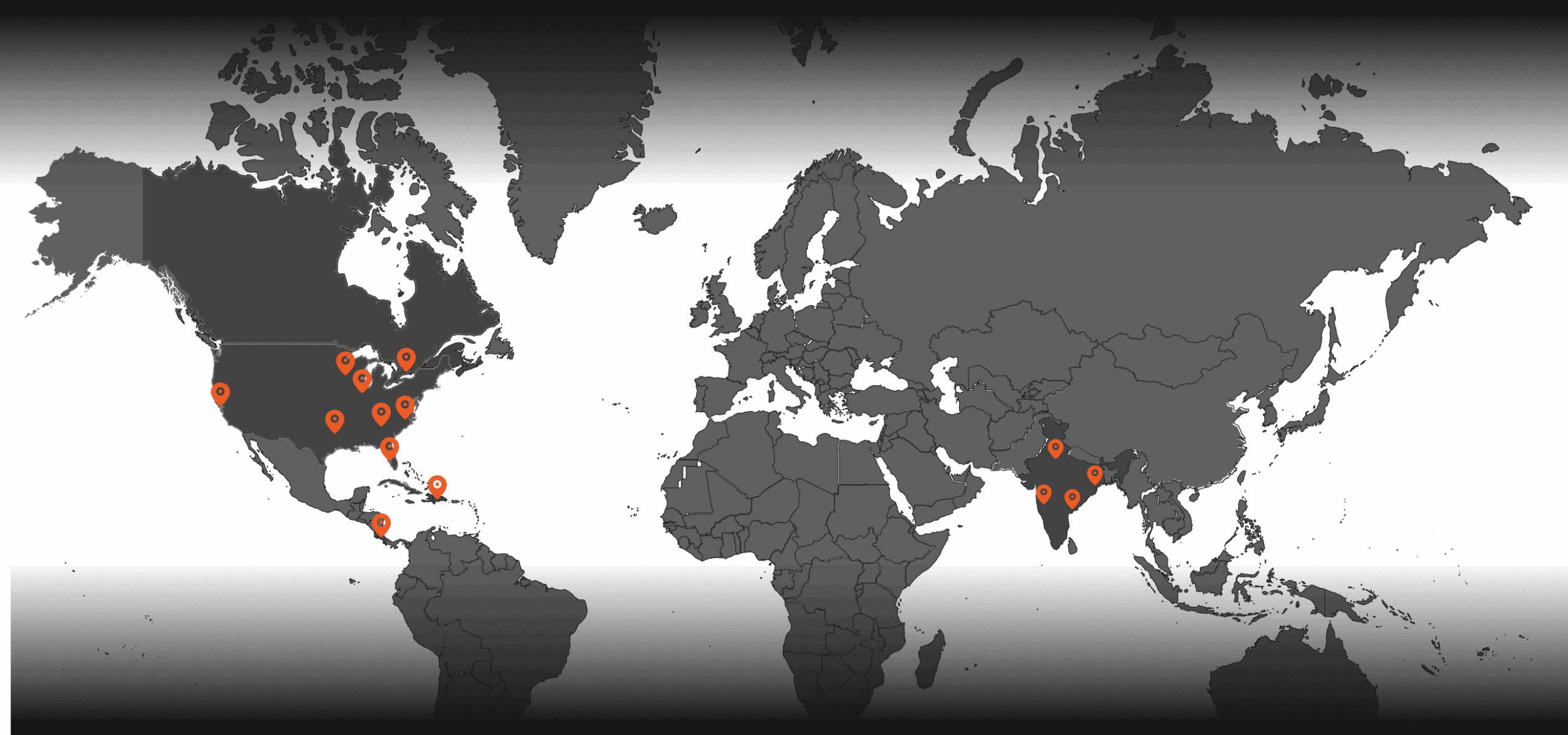 Impact services map with orange location markers on a dark grey background, representing SPECTRAFORCE'S operational reach.