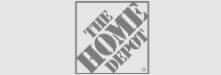 A grey version of The Home Depot logo, which consists of the words "The Home Depot" arranged diagonally within a rectangular border.