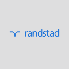 The image displays the Randstad logo, which consists of a blue, stylized "R" symbol on the left, followed by the word "randstad" in lowercase blue letters. The background is a light gray.