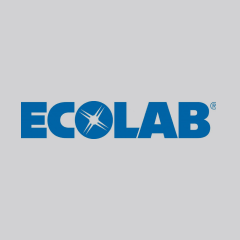 The image displays the Ecolab logo. The logo consists of the word "ECOLAB" in bold, blue uppercase letters. The letter "O" is stylized with a white starburst pattern inside it. The background of the image is light gray.