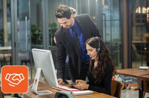 two people engrossed in work