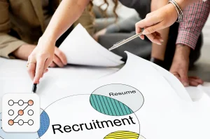 US hiring trends 2026 concept: Team of 3 reviewing a recruitment venn diagram