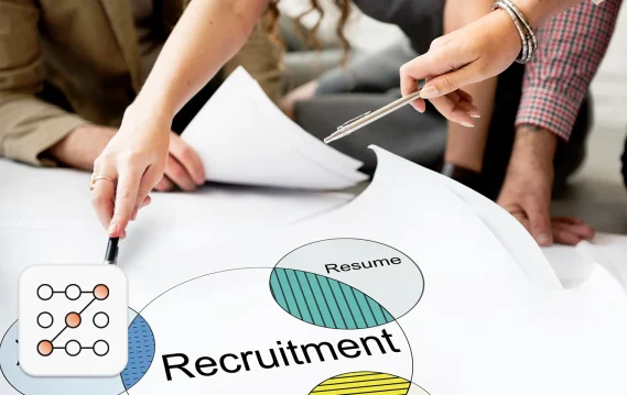 US hiring trends 2026 concept: Team of 3 reviewing a recruitment venn diagram