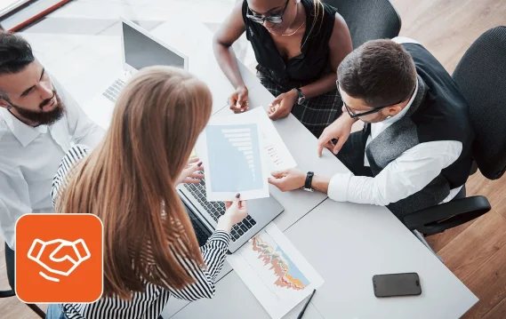 Team collaborating on project-based staffing strategy in an office setting